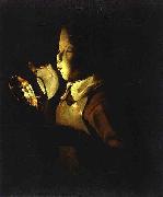 Boy Blowing at Lamp